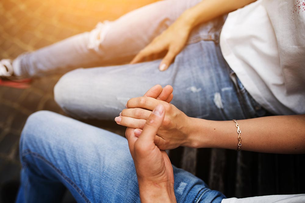 couple holding hands